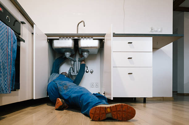 Professional Drain Cleaning technician working in Bokeelia, FL